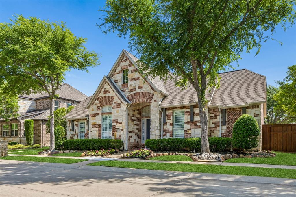 Refined Mayfair Custom home in the Village of Ballantrae — an intimate enclave within the master-planned community of Stonebridge Ranch and just moments from The Dye Golf Club at The Clubs of Stonebridge Ranch. Designed for discerning buyers who appreciate quality construction and thoughtful upgrades, this single-story residence offers solid oak flooring throughout most of the home, 8-foot solid wood doors, plantation shutters, and generous ceiling heights. The kitchen is both sophisticated and functional with stainless steel appliances, double ovens, gas cooktop, granite surfaces, abundant cabinetry, and a butler’s pantry with wine storage. Extensive improvements over time include a 40-year HD roof, upgraded drainage and gutter systems, solar attic fans, LED lighting, updated bathrooms and hardware, replaced windows, enhanced sprinkler system, dual water heaters with leak detection, and refreshed cabinetry and built-ins. The three-car garage is climate-controlled with epoxy flooring and insulated doors — ideal for a collector, hobbyist, or fitness space. The private backyard retreat features a raised spa, plunge pool, and covered patio, with updated pool equipment for ease of ownership. Additionally, it is beautifully landscaped with Japanese yews, junipers, and natural stone accents, creating a peaceful and low-maintenance outdoor retreat perfect for relaxing or entertaining.