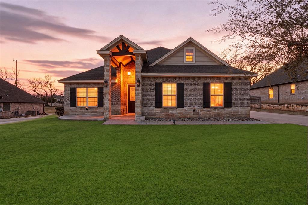 Wow...........MOVE IN READY UPDATED 4 3 2 on a large .39 acre lot in the sought out Pecan Plantation country club community...........2 PRIMARY bedrooms each with en suite bathrooms and walk in closets....... plus 2 more bedrooms...........Balcony with views...........Media or BONUS room too...........Updates include  ceiling fans, back door, dining room light, pendant lights, paint, driveway extended for plenty of PARKING, patio extended, newer dishwasher.....Bathrooms have new faucets, lights, and mirrors. Refrigerator conveys......WALK IN pantry..........NO CARPET downstairs........FIREPLACE, Gorgeous TREED backyard.......Clean and VERY well cared for........AMAZING community amenities include gated GUARD shack, GROCERY store, car wash, gym, pools, walking paths, dog park, country club, golf, camping, RIVER access, LAKE access, marina with BOAT DOCKS for rent, archery, equine, restaurants, vet, bank, Ace Hardware, security and much much more!!!