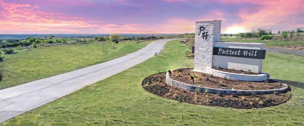 Fantastic VIEWS!!! As one of the highest elevations in Hood County you will have majestic views of Granbury, Comanche Peak, and the Brazos River Valley. This Estate lot will allow you to build that dream home with room for out building, pool, and lots of elbow room. Commuting to DFW for work? No problem, front gate is only 18 miles to I-20 in Benbrook and only 5 miles to HEB-Kroger shopping area in Granbury. Award winning custom home builder is offering discount if they build your home for you. Taxes?? Cresson currently has no city property taxes. The county and school taxes are some of the lowest in North Texas at 1.33%.  Surrounding areas are over 2.39%+.  Come make Putteet Hill your home.