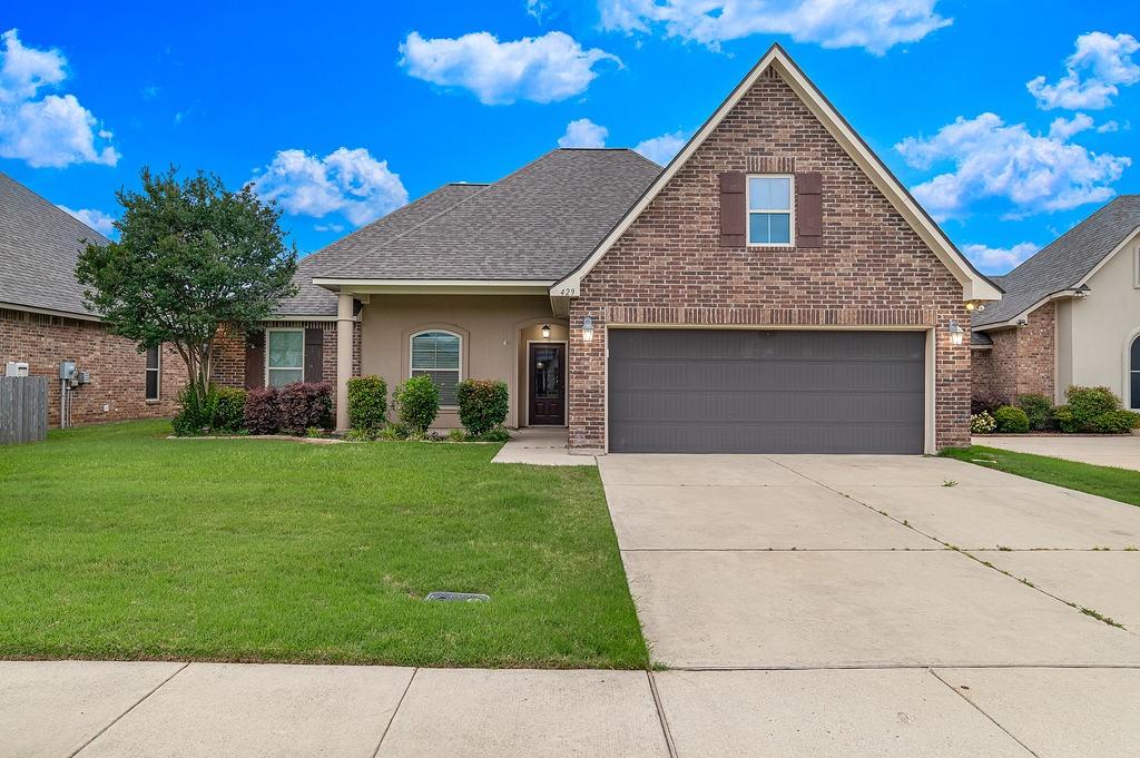 FRESHLY PAINT + GREAT LAYOUT =THE PERFECT MATCH!     
Welcome home to this beautifully maintained 4-bedroom home in Cypress Bend Garden! Conveniently located in Bossier City, this move-in ready property offers 1,965 square feet of comfortable living space with a functional open layout perfect for everyday living and entertaining. Step inside to find a freshly painted interior that gives the home a bright, clean, updated feel throughout. The spacious living area features a cozy fireplace, while the kitchen and dining spaces flow seamlessly for easy gatherings with family and friends. The remote primary suite offers privacy and comfort.  One of the oversized bedrooms is large enough for a sitting area, making it a great option for a mother in law suite, guest retreat, or flex space.  Outside, enjoy great curb appeal, a two-car garage, and a well-kept yard in an established neighborhood. This home does not back up to another home. Built in 2014,  this home combines style and space.  Conveniently located near some of Bossier's amenities, including Chasing Aces Golf, shopping, dining, and nearby outdoor recreation at Cypress Black Bayou. Don't miss this one!