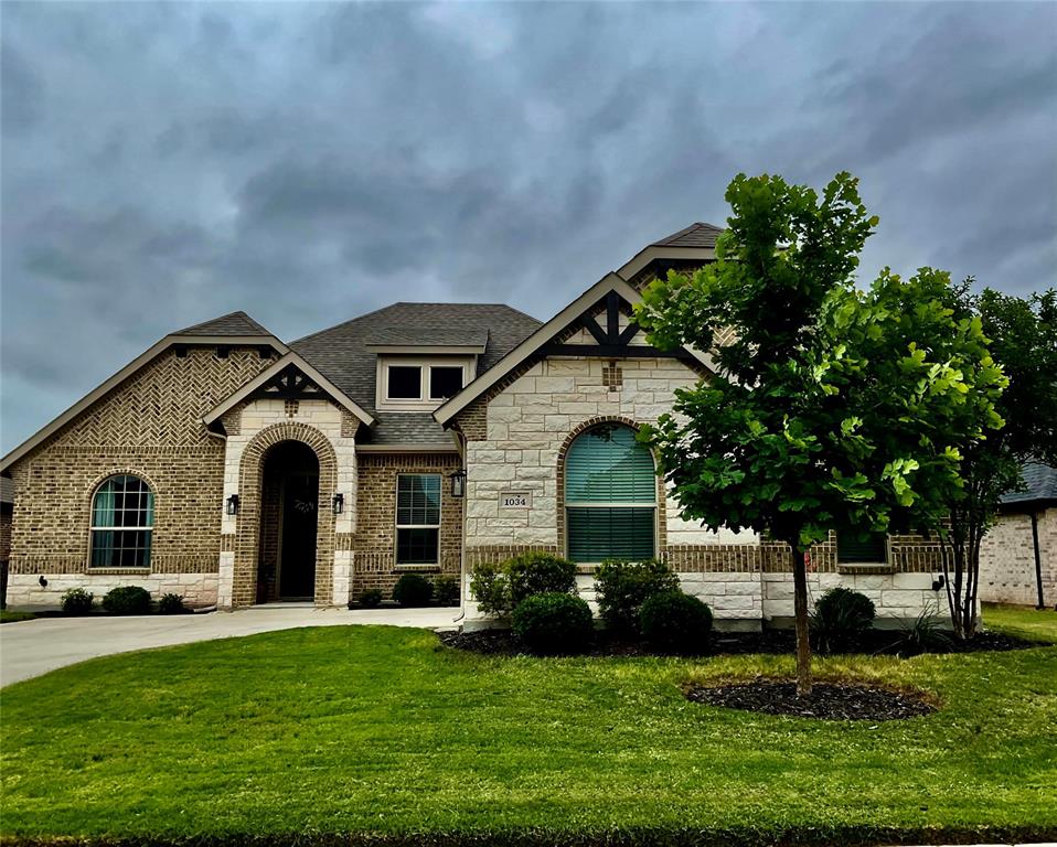Welcome to this beautiful home in Harbor Lakes Subdivision, a golf course community in Granbury. This lovely, well maintained residence features a split floor plan and spacious living areas. The large foyer with a boxed ceiling is impressive upon entering. A study with French doors is large enough to accommodate office use. The large master suite has a HUGE master closet and a large bath with a garden tub and walk-in shower. The family room kitchen is light and bright with a wall of windows. A floor to ceiling stone fireplace adds a cozy feel to the spacious room. The dining room is large enough for a 7’ dining table, 6 chairs and a buffet. With its convenient location, you'll enjoy easy access to local amenities and attractions. The neighbors are friendly and the area is quiet and peaceful. Don't miss the opportunity to make this your new home!