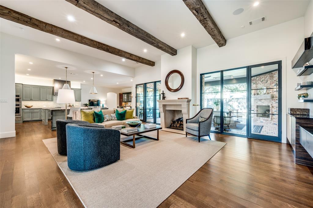 The stunning and thoughtful design and the high-quality finish out of this single story, 3,508 square foot home completed in 2022, makes this home a one of a kind property. Located in the private school corridor, this home is the builder's personal residence and reflects the attention to detail throughout including designer light fixtures, quartzite and marble countertops, and quartz countertops in the laundry room. Situated on a .38 acre lot with majestic oak trees, the well-designed floor plan includes a spacious and open living, dining and kitchen area with a beautiful view of the outdoor living space with retractable screens, heaters, and a fireplace providing a stunning view of the serene backyard.  The kitchen has a large island for meal prep and an island for dining and a beautiful scullery kitchen with a sink, under counter refrigerator drawers, appliance garage, built in pantry, and lots of storage making it ideal for overflow from the main kitchen and for dish and appliance storage. The 3 bedrooms have ensuite baths and large closets and there is a separate office with view of the backyard. The primary suite is especially well designed with 2 water closets and 2 closets with custom cabinets. This home exudes warmth and quality throughout and provides the perfect living spaces for entertaining, family gatherings and everyday living.  There is an unfinished space of 12 ft. by 17 ft. that could be transformed to a bedroom or living area - see floor plan in photos.