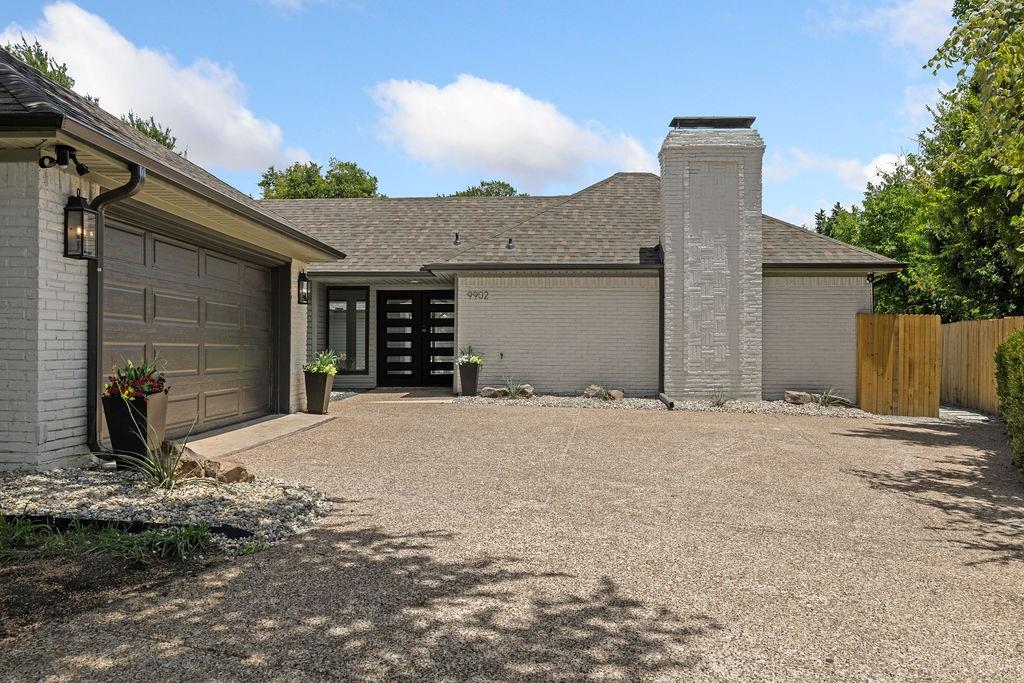 Completely reimagined from top to bottom, this stunning 4-bedroom, 2.5-bath home blends modern luxury with everyday functionality. Tucked away on a quiet cul-de-sac, the home features an open, light-filled floor plan with luxury vinyl plank flooring, quartz countertops, an oversized chef’s kitchen, and a stylish wet bar—perfect for entertaining.

The expansive primary suite offers over 400 square feet of private retreat space with dual walk-in closets and a spa-inspired bath featuring a soaking tub, separate shower with rain showerhead, and a built-in clothes hamper.

Step outside to your own resort-style backyard with a heated pool and spa, recently replastered and backed by a transferable 10-year warranty. Whether hosting friends or enjoying a quiet evening, this outdoor space is designed for year-round enjoyment.

A detached workshop with dedicated electrical service provides endless flexibility for a home office, fitness studio, art studio, hobby space, workshop, or future climate-controlled storage with the addition of a mini-split HVAC system.

Extensive updates provide exceptional value and peace of mind, including a complete interior renovation, lifetime transferable foundation warranty, new irrigation system, new gutters, updated fencing, and the newly replastered heated pool and spa with transferable warranty.

This is more than a beautifully remodeled home—it's a thoughtfully designed property offering luxury, versatility, and move-in-ready confidence.
