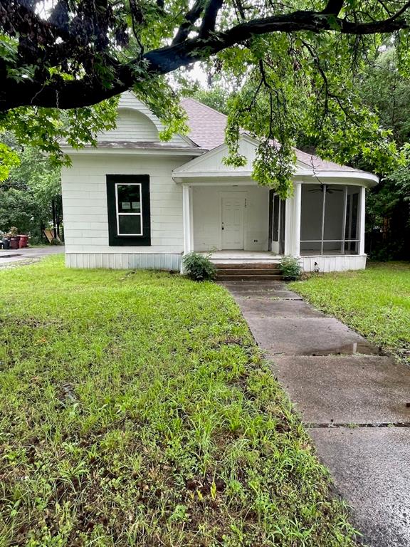 1495 sq. ft. home sits on a corner lot near downtown Bonham. This is the perfect home for the first time homeowner looking to purchase their new home in a quiet neighborhood within walking distance to the square, or the investor looking for the next income producing property.
 With 5 bedrooms and 2 baths, has enough space for the family with room to grow. 
Updates including new kitchen cabinets, new carpet throughout. Bathroom renovations and new mini-split unite for each room to ensure quality climate control as well as efficiency. New water heater. 
Come take a this cozy little house and sit on the screened in porch and you will want to make it your own.