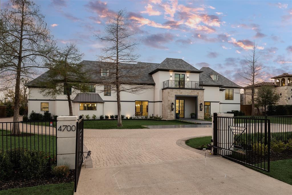Beautifully reimagined gated estate on nearly 1.2 acres in the heart of prestigious Strait Lane corridor of Preston Hollow. Country club experience with 2,300 sqft pool house, terraces, sport court, pool, spa & grassy lawns. Entertain on first floor with grand foyer, formal living & dining, media room and family room or lounge. Gourmet kitchen includes second catering kitchen, butler's closet and walk-in pantry. Dual level primary suite features private outdoor sitting area. Upstairs from the main closet, enjoy a second sitting area and closet for off-season attire, as well as an office with private balcony. Four secondary bedrooms are up, including au pair suite with private entrance. Split-level gym incl spa-like massage or yoga studio with steam shower. Outside, the guest house offers luxurious accommodations and extra entertaining space. Situated at the end of Lennox Lane offering beautiful views and a dramatic approach, with quick access to Dallas’ top schools, shopping & dining.
