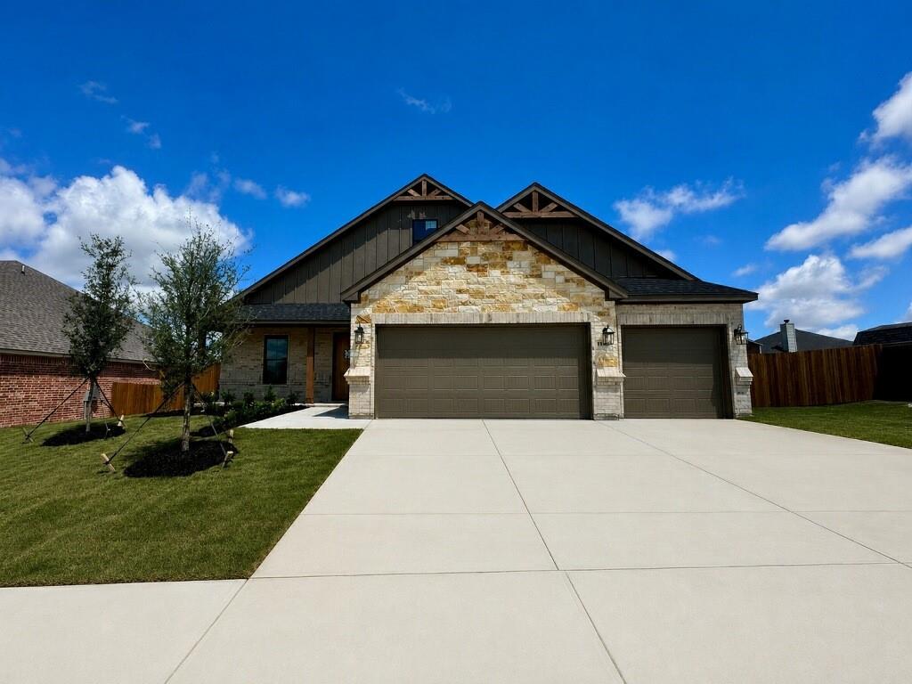 Seller now offering $7500 buyer incentives! This beautifully crafted home has a large open kitchen custom cabinetry with 42in uppers large granite island with undermount 50 50 sink and concealed trash cabinet. The stainless Whirlpool appliances make this kitchen a chefs dream Elevated ceilings with double crown molding in living area single stage in kitchen, dining, entry and primary. Oversized 5.25 baseboards throughout. Ceiling fans with light in living and primary, guest bedrooms are wired as well. Luxury water resistant vinyl plank flooring in the main areas and hallway. Full security system. The grand entry way opens into the nice living room featuring large glass sliding door. Energy efficient windows throughout. Primary bathroom has fully tiled showers with accent flooring. The exterior is beautifully designed with brick and decorative stone. An insulated 2 car fully finished garage has neatly textured walls and baseboards. Encapsulated foam insulation for highest energy efficiency. A full sprinkler system landscaping with 2 trees as well as the nice size backyard.