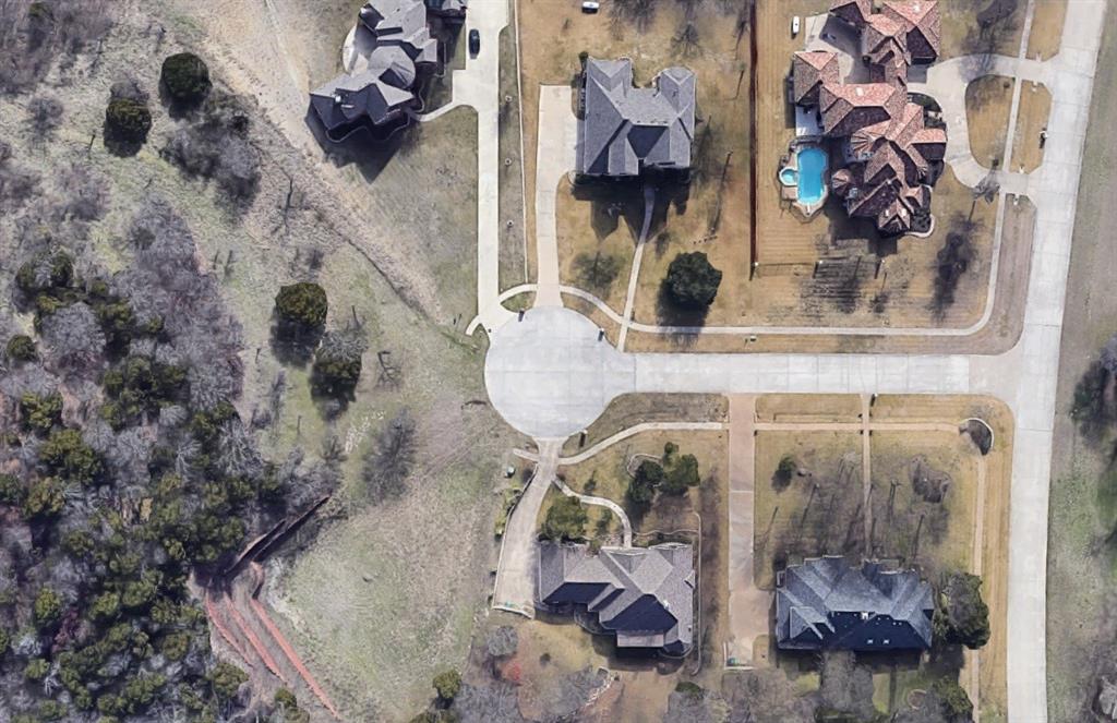 Premium Cul De Sac Lot with an incredible view of the neighborhood. Build your dream home on this 1.01-acre lot and become a part of the gorgeous community of Lake Ridge At Joe Pool Lake. The neighborhood features beautifully landscaped parks, walking trails, and a community pool *Buyer To Pay A 1% Processing Fee At Time Of Close.*