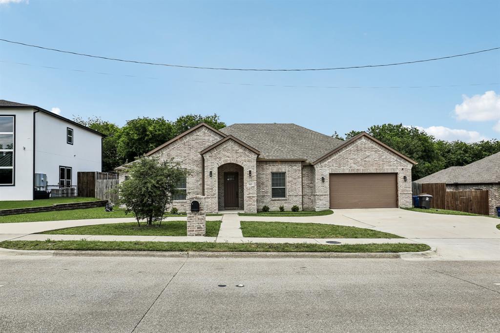 Welcome to this beautiful one story, 5 BEDROOM, 2.5 bathroom home! Pull up to a circular driveway with enough space for multiple vehicles. The attached 2 car garage comes equipped with a Tesla wall charger for electric cars. WALL CHARGER conveys with accepted offer. Two SECURITY CAMERAS installed on the exterior of the house convey with an accepted offer. The upgraded Foyer with a decorative wood slate wall makes a fabulous first impression. Open concept living room, dining room and eat-in kitchen with island and bar seating. REFRIGERATOR conveys with accepted offer. Two of the bedrooms have en suites and are located on opposite sides of the home, perfect for multi-generational families. Staying organized is easy with the mud room drop zone. Enjoy a spacious laundry room, complete with clothes hanging bar! WASHER & DRYER convey with accepted offer.  Newly installed rain gutters, foam insulation, tankless water heater and LOW E windows for maximizing home energy efficiency. The oversized backyard is enclosed with a wooden privacy fence and upgraded with a cement block patio extension and pergoulux pergola. This home is turn key for settling in and making long-lasting memories! Please ask for the full list of upgrades.  Enjoy all this community has to offer - Dallas Zoo, Bishop Arts, Halperin Park, several golf courses, Keist Park, Oak Cliff Nature Preserve and premier shopping and dining. Please see FLOORPLAN in Photos.
