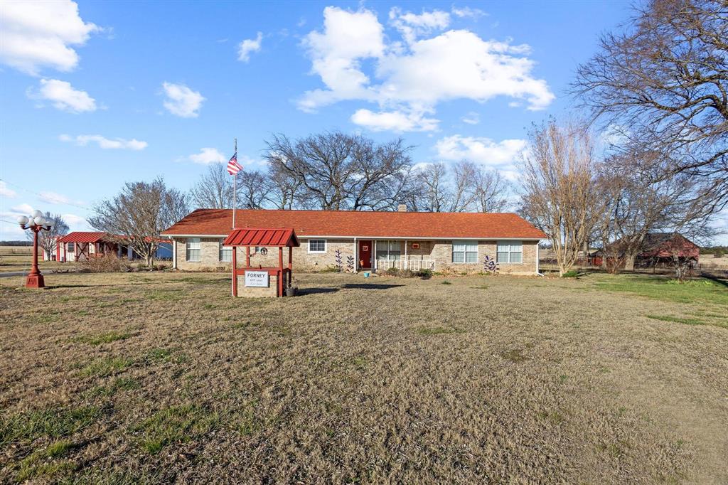 Set up for true ranch living, this 86-acre property offers FM road frontage, improved pasture, and the space and infrastructure to support livestock and recreational use. Located just 10 minutes southwest of Paris, TX, the property provides both convenience and privacy.
The 2,101 sq ft brick home, built in 1995, features 2 bedrooms and 2 full bathrooms along with a 2-car garage. A separate shop adds additional space for equipment, storage, or projects. The land is well-suited for ranching, with ample water sources for livestock, including two ponds located within the pasture.
With open grazing land, multiple water sources, and opportunities for hunting and fishing, this property is ideal for a working ranch, recreational retreat, or rural homestead. A solid combination of usable land, improvements, and location makes this a well-rounded country property.