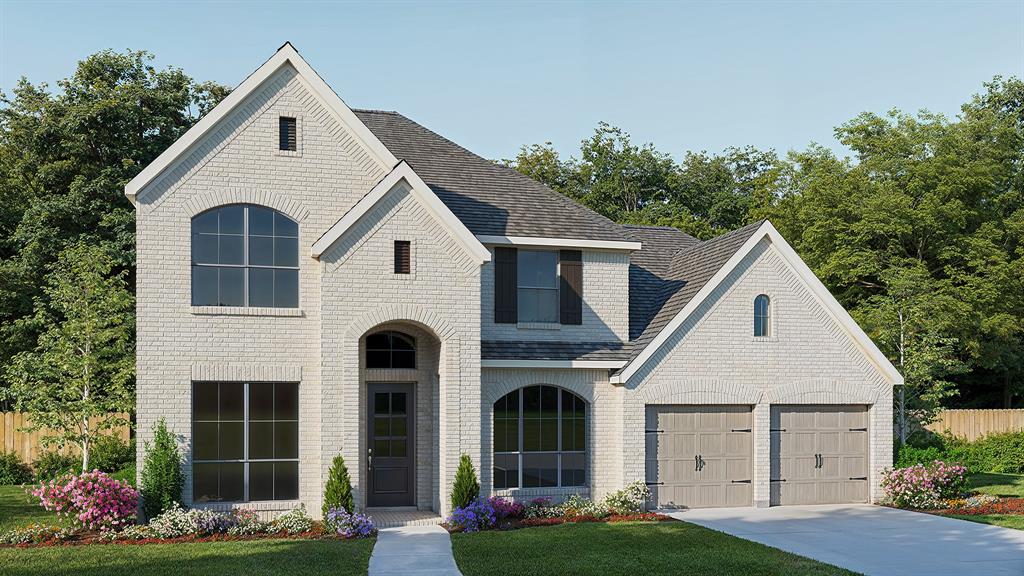 Home office with French doors and formal dining room along one side of two-story entry. Two-story family room with wall of windows and wood mantel fireplace opens to kitchen and morning area. Kitchen features 5-burner gas cooktop, walk-in pantry, a butler's pantry and generous island with built-in seating space. First-floor primary suite. Dual vanities, a garden tub, separate glass-enclosed shower and two walk-in closets in primary bath. A second bedroom is downstairs. Theatre room, game room and three secondary bedrooms are upstairs. Extended covered backyard patio. Mud room off three-car garage.