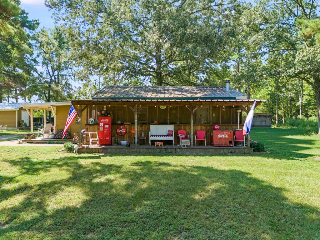 68.5± Acres with Cabin, Tiny House & Commercial Buildings – Big Sandy, TX

Prime opportunity to own a multi-parcel property totaling 68.5± acres just north of Big Sandy. This diverse tract features a mix of open areas and heavily wooded sections, offering both usability and privacy.

Property Highlights:

Residences: Recently updated cabin plus a brand-new tiny house, ideal for full-time living, weekend retreats, or guest accommodations.

Commercial Improvements: 6,000± SF metal shop with attached living quarters, along with an additional 8,000± SF of buildings suited for workshops, storage, or business operations.

Land: A versatile mix of open pasture and heavily wooded acreage, providing excellent hunting, recreation, or homestead opportunities.

Whether you’re looking for a family getaway, a recreational retreat, or the perfect spot to combine your home and business in one location, this property offers endless possibilities.