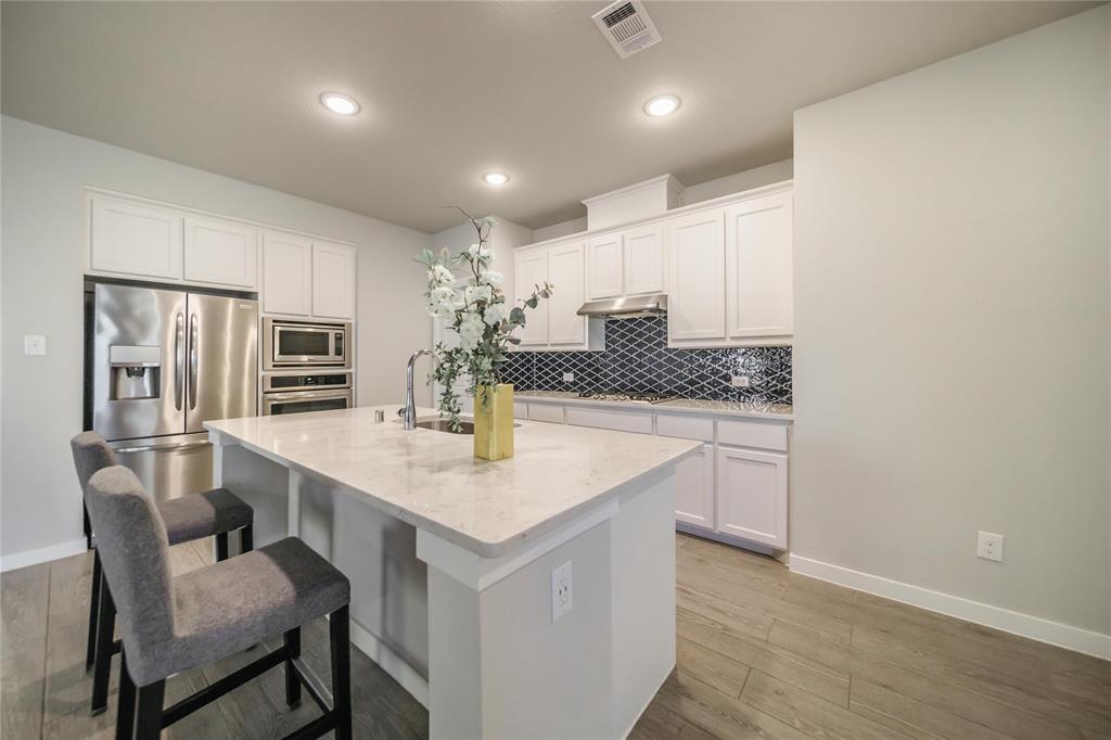With a highly motivated seller, this is an incredible opportunity—don’t wait, schedule your showing today! 
Great open layout, perfect for relaxing after a long day or for entertaining guests for gatherings. The upgraded kitchen serves as the heart of the home and features all stainless appliances with generously sized island and gas cooktop. Primary bedroom sits away from other bedrooms and is it's own private retreat. Dual sinks with separate shower and tub in the primary bathroom. Other features include: Tankless water heater, 16 Seer Trane AC system, and Wifi thermostat. All appliances convey (including washer, dryer, and refrigerator)! Come see all this wonderful home has to offer!