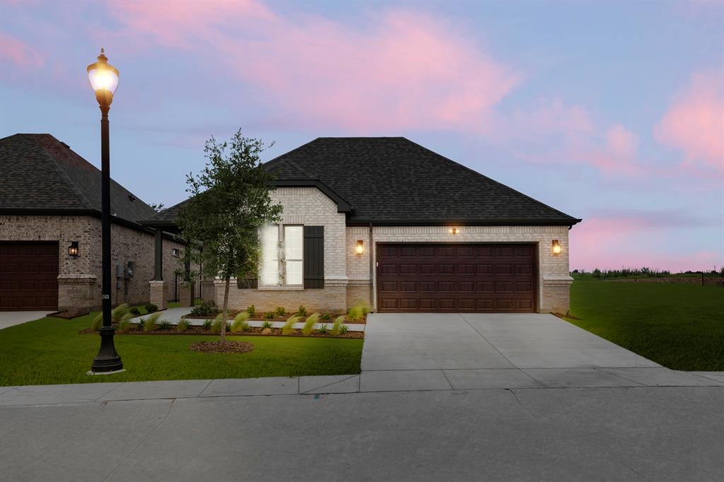 MLS# 21213672 - Built by Ladera Living - Ready Now! ~ Beautiful single-story home in the sought-after Ladera Living community in Prosper! This 2-bedroom, 2-bath home offers 2,089 sq. ft. of thoughtfully designed living space, perfect for comfort and convenience. The open-concept layout features a spacious living area, dedicated dining room, and a private study—ideal for a home office or flex space. Enjoy outdoor living with a welcoming front porch and covered rear patio, perfect for relaxing or entertaining. The 2-car garage provides ample storage, and the low-maintenance design supports a lock-and-leave lifestyle. Located in a vibrant 55+ active adult community with exceptional amenities and a convenient Prosper location.