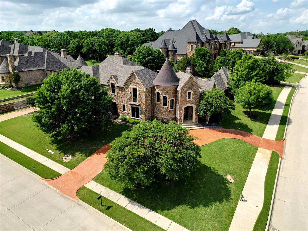 HIGHLY COVETED CLARIDEN RANCH IN SOUTHLAKE*SITUATED ON A 1 ACRE PRIVATE CORNER LOT*LET THE STRESS OF DAY MELT AWAY IN THE BACKYARD PARADISE W OUTDOOR KITCHEN, POOL-SPA, OUTDOOR FIREPLACE, PATIO & GRILL* CASTLE TURRET DESIGN IN FRONT*EXQUISITELY FINISHED INSIDE & OUT*SECLUDED OWNERS RETREAT W LARGE SITTING AREA, LUXURIOUS BATH & FIREPLACE*GOURMET KITCHEN*GRANITE ISLAND IS 9X7*EACH BEDROOM FEATURES EN-SUITE BATH*2 BEDROOMS DOWN*DOME CEILING AT ENTRY W DRAMATIC STAIRCASE*CUSTOM FLOORS*NEW CARPET APRIL 2024*SOLID DOUGLAS FIR HAND-HEWN BEAM ACCENTS ON SEVERAL CEILINGS*HARDWOOD FLOORS WITH SEAMLESS FLOOR TRANSITION, OCTAGONAL DESIGN IN FAMILY ROOM*QUALITY*EXTENSIVE TRIM & MILL WORK*ENTERTAINERS DREAM*MEDIA ON 1ST LEVEL*3 BEDROOM PLUS GAME ROOM UP*3 LIVING TOTAL*STUDY*WINE ROOM*3 OF 4 HVAC UNITS REPLACED SINCE OWNER PURCHASED*4 CAR GARAGE*OTHER AMENITIES INCLUDE FOAM INSULATION, OVER 100 PIERS IN SLAB,*UPSTAIRS BATH REMODELED*NEW MEDIA EQUIPMENT*SEE AMENITIES LIST & DRONE VIDEO*