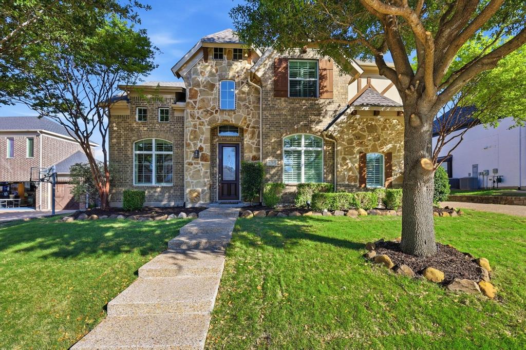 New low price plus low interest rate incentive! Check it out while you can. From the moment you step through my front door, the grand staircase, soaring vaulted ceilings, and expansive windows create an immediate sense of arrival. Multi generational living set up with primary bedroom and guest bedroom downstairs with full bathroom, and 3 bedrooms upstairs. Natural light pours in making the engineered hardwood floors glow with life and highlight the chandeliers and plantation shutters. My formal living and dining rooms are spacious and eligant, while the heart of the home balances beauty and function. Natural wood cabinetry, stainless steel appliances, designer backsplash, island, built-in wine rack, and the breakfast nook create a kitchen that naturally draws everyone together. Just beyond, a warm fireplace anchors the main living area, while the wet bar stands ready for celebrations both large and small. Settle into the media room for movie night, or step outside to the covered patio overlooking a sprawling backyard with ample space for a future resort-style pool. This custom home was designed with comfort, connection, and memorable experiences in mind. The primary suite offers a private retreat worthy of its scale. The spacious bath features dual vanities and a garden tub separate from the tiled shower. Behind the scenes, significant improvements provide peace of mind, including fresh interior paint, updated light fixtures, all new window screens, and a roof replaced in 2024. And don't forget my surround gutters. Nestled within the prestigious Estates of Verona and served by acclaimed McKinney ISD, this residence enjoys access to the lifestyle that has made McKinney one of North Texas' most sought-after destinations. Spend evenings dining at Rick's Chophouse, Harvest, Local Yocal, or The Yard. Explore the boutiques and charm of Historic Downtown McKinney, enjoy one of the many nearby golf courses, or play a game of Cricket at nearby parks.