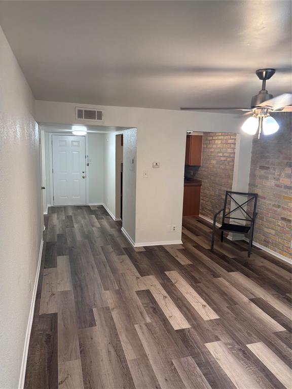Welcome home to this beautifully renovated condominium at 6004 Westridge Lane Unit 705 in Fort Worth Texas 76116. Nestled in the Spanish Gardens community this residence offers approximately 806 square feet of modern comfortable living with fresh updates throughout.Step inside to discover durable wood look flooring that flows seamlessly through the open living areas creating a bright airy feel. The spacious living room features a stylish ceiling fan and large windows that fill the space with natural light while offering peaceful views of the surrounding greenery. Relax on the private patio just steps away.The kitchen is fully equipped with white appliances including a gas stove refrigerator and microwave. It showcases warm wood cabinetry speckled countertops and a stylish brick accent wall for added charm and functionality.The generous bedroom provides excellent storage with a large closet featuring built in shelving and dual hanging rods. The updated bathroom includes elegant white subway tile surrounding the bathtub shower combination a modern vanity and contemporary fixtures.This move in ready unit blends comfort convenience and style in a prime Fort Worth location. Perfect for those seeking an updated home with easy access to everything the area has to offer.