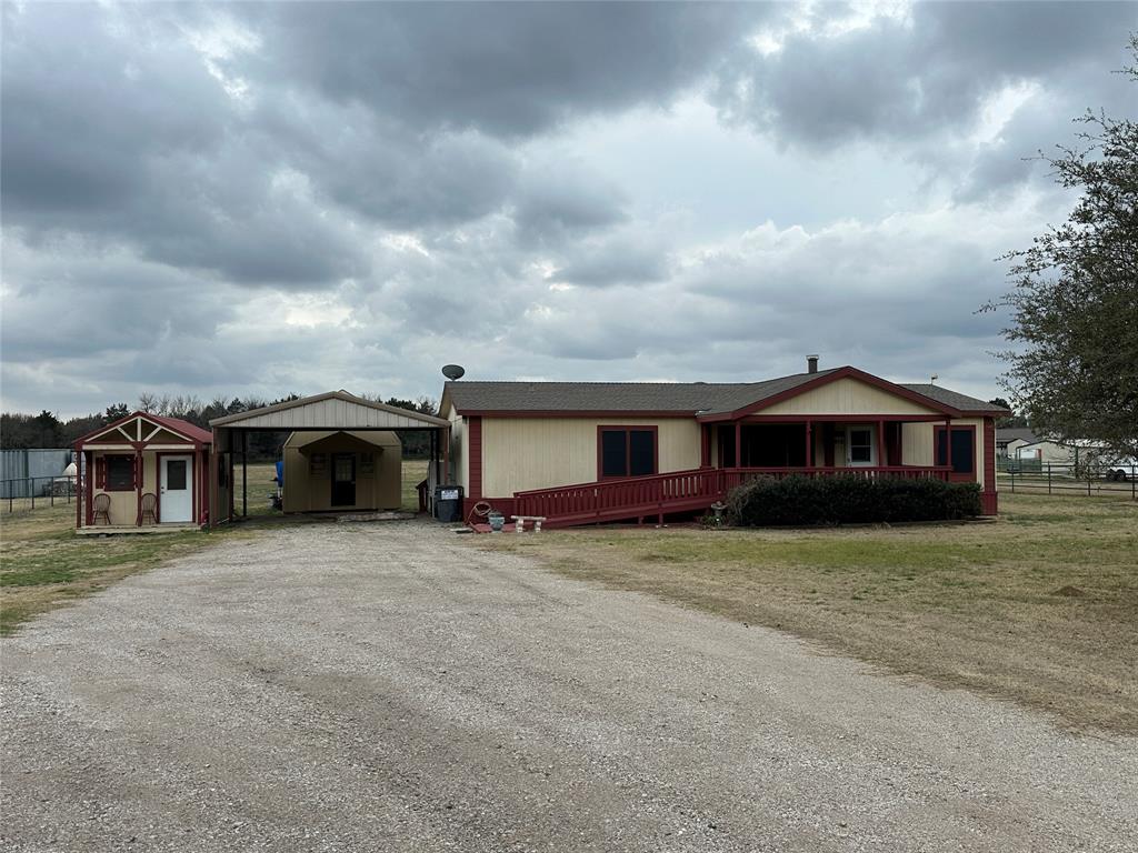 Perfect spot for your weekend getaway to Lake Texoma.  Less than a half mile from several Marinas on beautiful Lake Texoma.  Cute double wide manufactured home situated on 1 acres with a couple of outbuildings for piddling.  Less than five miles to Megastar Casino, Rock Creek Resort and Bumcome Golf Course.  Great little hideaway to relax.
