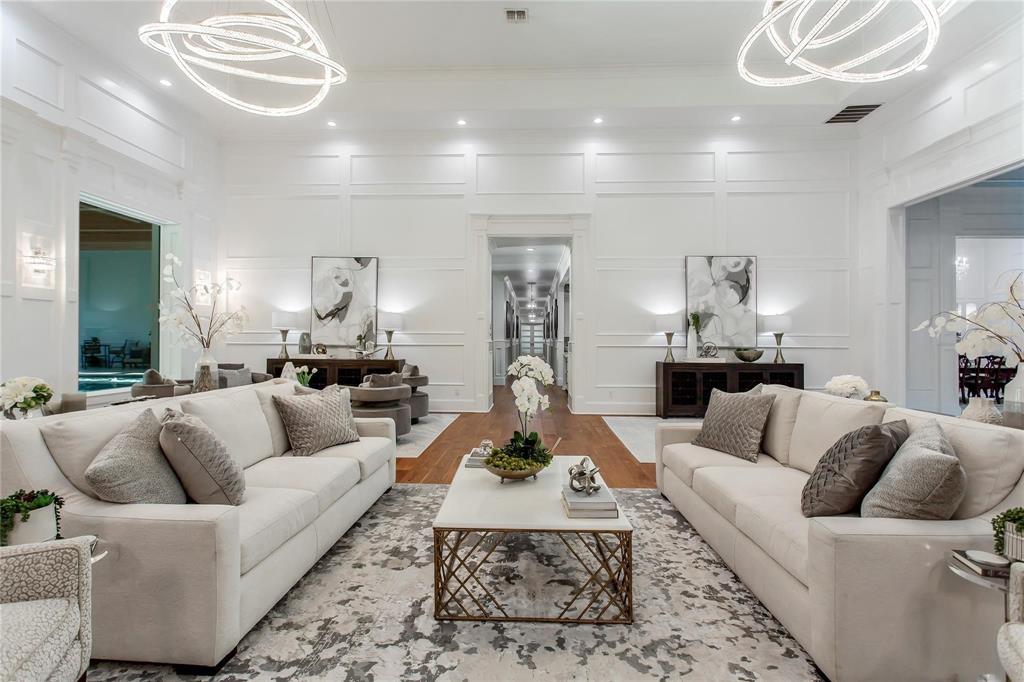 Offered well below recent appraisal, this extraordinary custom estate is the crown jewel of the county—just 35 minutes from Downtown Dallas. Masterfully designed for luxury, privacy, and unparalleled amenities, this gated 5-acre sanctuary features mature trees, a fully stocked pond, a rare spring-fed white rock creek, and a private pickleball court for active living.  Built in 2023 to exacting standards, the main residence showcases six grand ensuite bedrooms with spa-caliber baths and expansive walk-in closets, plus a dedicated executive office with private entry for optimum work-life balance. The 2,800 sq ft private guest house is ideal for multi-generational living or hosting extended family and friends.  Entertain and unwind in style with an 800-bottle wine cellar, theater and game rooms, music and craft studios, and an outdoor patio with fire pit and bar—perfect for gatherings or relaxing beside the serene landscape. A truly impressive wellness retreat awaits inside: a heated 65,000-gallon indoor pool bathed in natural light, state-of-the-art fitness center, luxury sauna, and chef’s kitchen with premium appliances.
Additional features include a climate-controlled 4-car garage, RV garage, safe room, elevator-ready design, and sustainable engineering. Enjoy the peaceful beauty of a live creek that runs through the property, blending tranquility with bold architecture.
Whether you envision a legacy estate, family compound, or secluded retreat close to city conveniences, this one-of-a-kind offering redefines luxury country living near Dallas. Contact [Your Name], luxury real estate specialist, today to schedule your private showing.  Reach out to Karen Cuskey-Hartman for a property brochure with additional details or private tour.