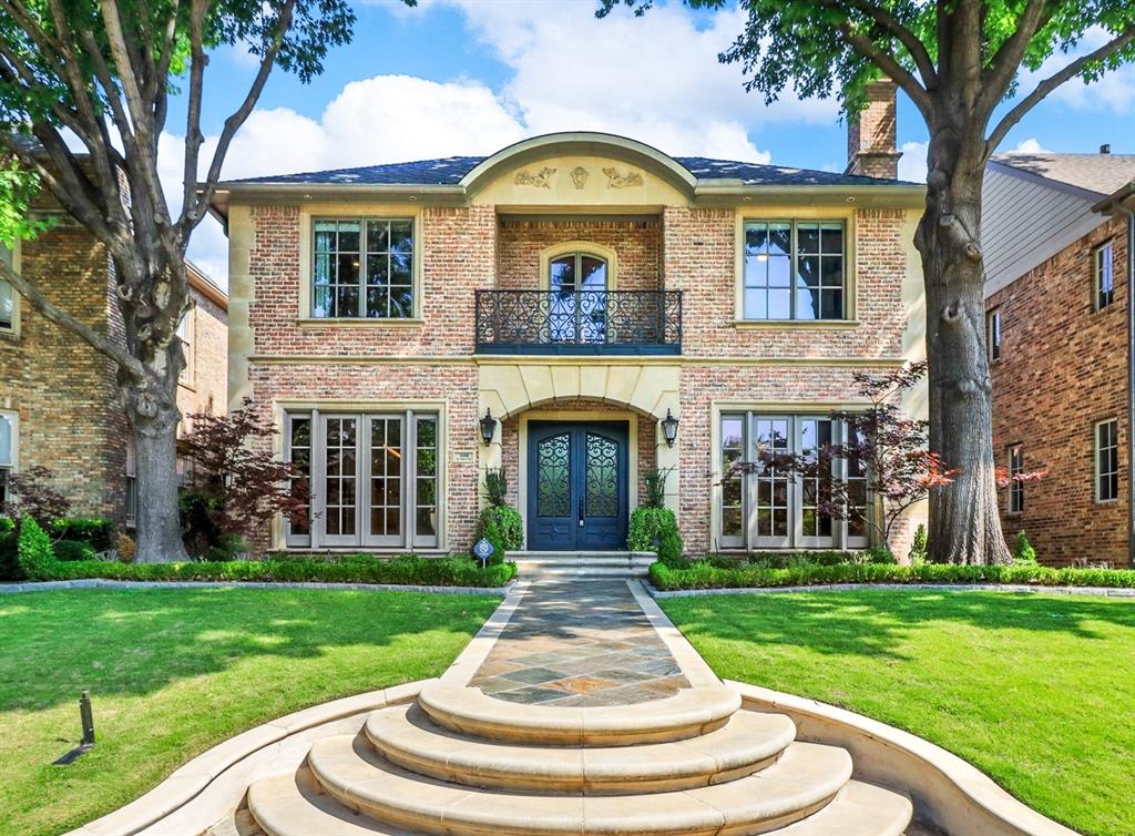 Experience luxury living in this exquisite Highland Park custom home, featuring 5 bedrooms, 5.2 bathrooms, and 5,146 square feet of stunning living space. The exterior boasts intricate details, including brick veneer, cast stone, and slate pavers, while the interior is adorned with elegant wood cased windows, decorative stone details, and hardwood and ceramic tile flooring. The backyard is a true oasis, complete with a sparkling pool and kitchen area for perfect outdoor entertaining. Downstairs, discover a wine cave, wet bar, and office, as well as two living areas with a cozy fireplace. Enjoy the light and bright breakfast area for casual dining. All bedrooms are located upstairs, along with a laundry room and balcony. The large master suite is a true retreat, featuring a jetted tub, glass shower and large walk-in closets. The home also features a 2-car garage with an exterior retractable awning, providing two additional covered parking spaces. Just blocks away from SMU.