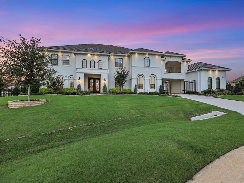 Welcome to this exquisite estate located in the highly sought-after Townlake neighborhood of Flower Mound. This luxurious residence boasts multiple grand staircases, connecting its expansive living spaces. The open floor plan is adorned with hardwood and marble floors, creating an atmosphere of elegance and sophistication. The kitchen features a commercial-grade range and vent, built-in appliances, and a dedicated wine cellar, perfect for entertaining and culinary adventures. The luxury master suite offers a spa-like bathroom, providing a serene retreat with its opulent fixtures and finishes. For entertainment and relaxation, the home includes a media room and a game room. Step outside to discover a perfectly manicured lawn, ideal for outdoor activities. The outdoor kitchen and living space are perfect for hosting gatherings, while the balcony offers breathtaking sunset views. This property epitomizes luxury living in Flower Mound, offering unparalleled amenities and exquisite design.