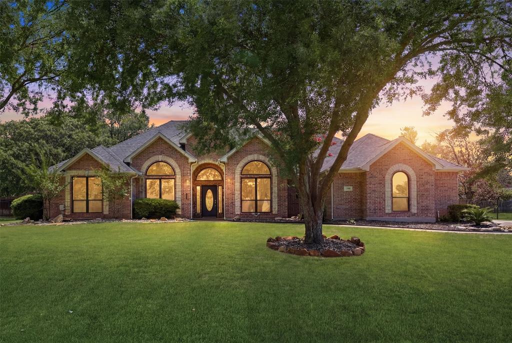 Life is better when your home keeps up with you — and this one does it all. Tucked in the Stoney Creek community of Acton with no HOA, this 4-bedroom, 3-full-bath showstopper features a versatile fourth bedroom that’s ideal as a home office, guest room, or flex space.
Step outside to a backyard built for making memories — sparkling pool with built in hot tub, both of which can be heated and lights up at night with lighting. Fully equipped outdoor kitchen, 2 outdoor seating areas, 2 separate fire pit areas one propane and the other wood-burning, rocked corn hole court, cactus garden, playground, and full privacy fence. Lush landscaping, mature trees front and back, and manicured grounds give incredible curb appeal and a peaceful, established feel. A convenient half bath outside keeps the party going without anyone tracking water through the house.
Pull into a large driveway with a spacious 3-car garage with a built-in workbench — ready for anyone who wants serious storage and workspace.
Inside, new windows, flooring, and paint throughout give it a clean, move-in-ready feel. The pool table conveys if desired, so the good times start from day one. Pub table with chairs can be negotiated. Gathering spaces flow beautifully with room for everyone and every occasion. A discreet, alarm-equipped safe room provides dedicated secure storage for your firearms — tucked away and completely out of sight.
Location? Unbeatable. Five minutes to HEB and ten minutes to Granbury's iconic historic square — home to award-winning restaurants, one-of-a-kind boutiques, and the charm of a city voted most historical city in America. This one won't last long!