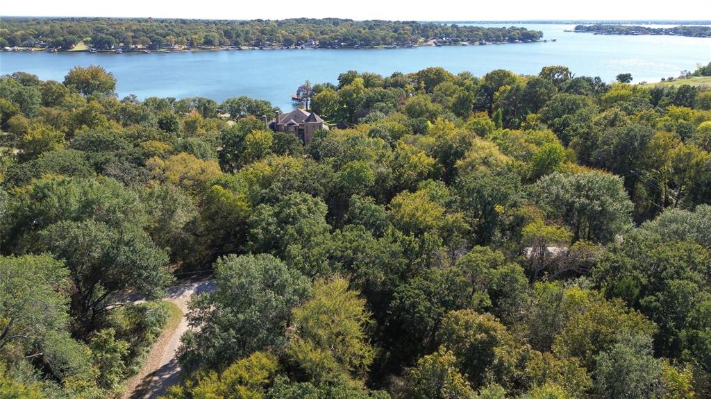 Just seconds from scenic Cedar Creek Lake! Located at the end of Coahoma St., this corner parcel offers both privacy and ease of access and visibility
Spanning approximately 7,633 sq ft., the lot provides ample space for your ideal home, outdoor living, and possible garage or RV area.