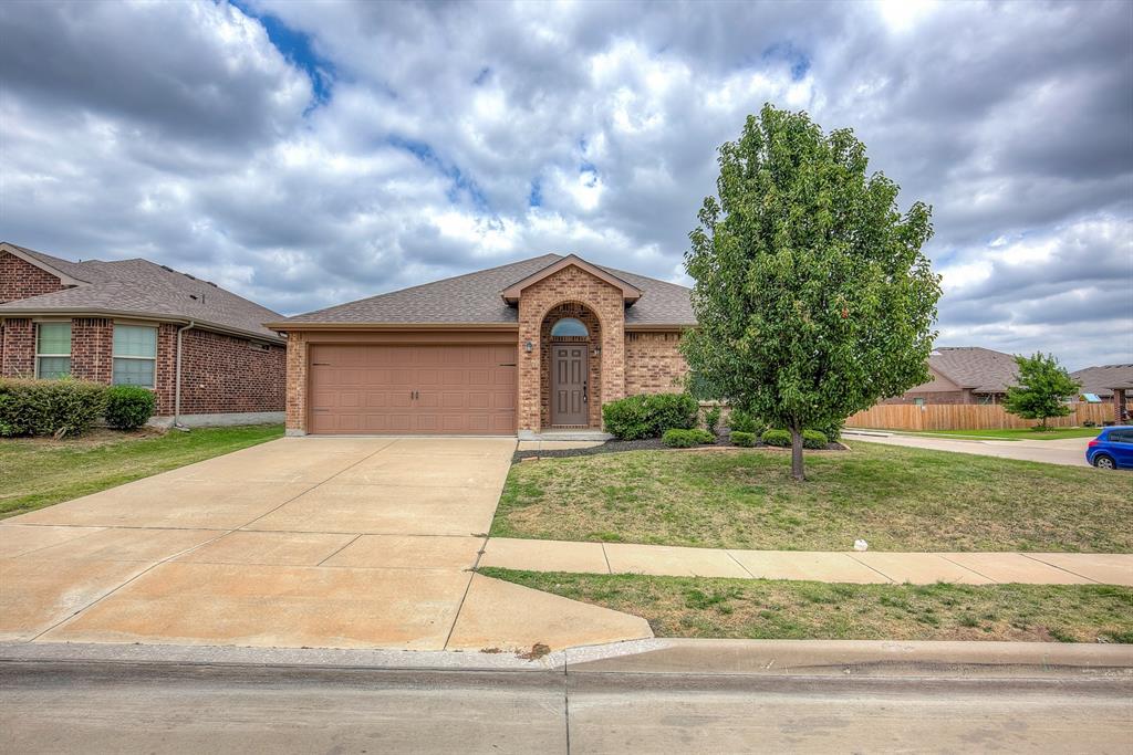 Back on Market Buyer Financing Fell Through! Nestled on an oversized corner lot in the desirable Boswell Ranch community, this beautifully maintained 4 bedroom, 2 bath home offers the perfect blend of comfort, functionality, and location. With no neighbors behind, enjoy added privacy and peaceful backyard views from the covered patio. Inside, the open concept floor plan features a spacious living area, plush carpeting and ceramic tile flooring, and abundant natural light throughout. The eat in kitchen is designed for both entertaining and everyday living with granite countertops, a large island, breakfast bar, dual sinks, and pantry, with ample built in cabinetry. The private primary suite includes dual sinks, a walk in closet, and an ensuite bath, while three additional bedrooms provide flexible space for family, guests, or a home office. A separate utility room and attached 2-car garage add convenience to daily living. Located within the highly acclaimed Eagle Mountain Saginaw ISD and just minutes from Eagle Mountain Lake, this home also offers convenient access to Lake Country Christian School, shopping, dining, major highways, and NAS JRB Fort Worth. A rare combination of space, privacy, and prime location in one of North Fort Worth’s fastest-growing areas. This home is listed and priced to sell!