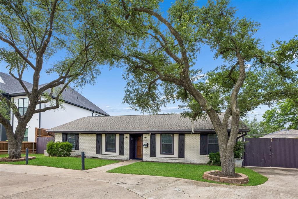 MUST SEE IN PERSON to appreciate the updated comfort and exceptional versatility at 3534 Royal Lane, a spacious Dallas residence offering 4 bedrooms plus a flexible bonus room ideal for a fifth bedroom, office, gym, or media space. This move-in ready home features 3 bathrooms and approximately 2,092 square feet of functional living space designed for both everyday living and entertaining. Originally built in 1961 and thoughtfully refreshed with modern improvements, the property blends classic character with practical updates in a convenient North Dallas location. Inside, buyers will appreciate two generous living areas that adapt easily to entertaining, remote work, game nights, or multi-generational living needs. Recent upgrades include fresh interior paint, luxury vinyl flooring, updated fixtures, remodeled bathroom finishes, upgraded AC completed approximately two years ago, new ventilation ducts, and additional attic insulation for improved comfort and efficiency. Large windows throughout the home bring in abundant natural light and create a bright, welcoming atmosphere. The kitchen connects efficiently to the main living and dining spaces, making gatherings and daily routines easy and functional. Outside, the property offers amenities rarely found at this price point and location. A covered patio, summer kitchen area with additional laundry space, picnic area, and fully fenced backyard create an inviting outdoor retreat designed for relaxing and entertaining. Additional highlights include extensive parking, a small playground area, and two separate storage or workshop sheds that provide excellent flexibility for hobbies, equipment, projects, or extra storage. Mature landscaping and perimeter fencing enhance both privacy and curb appeal. Conveniently located near Royal Lane with quick access to I-635, I-35, shopping, dining, entertainment, and major commuter routes, this property offers exceptional flexibility, accessibility, and value in the heart of N. Dallas.