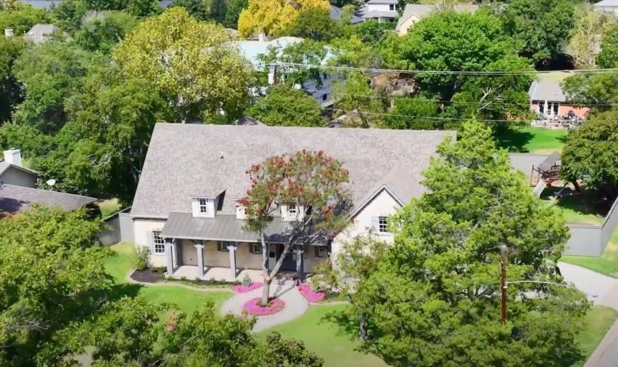 This stunning home in the heart of Dallas' prestigious Preston Hollow neighborhood was reimagined and brought to life by noted builder and designer Nolen Homes in 2011. Featuring an open floor plan with an abundance of windows that bathe the home in natural light, the property flows seamlessly from room to room, indoors to out. Situated on an oversized corner lot measuring .43 AC with backyard views from the majority of rooms, highlights include custom trim and cabinetry, designer wallpaper and light fixtures, two owners suites on the 1st and 2nd floors, multiple living areas and tall ceilings. The main level is anchored by an open kitchen living space with floor to ceiling windows, a breakfast nook and dining area, private home office, an owner's suite and guest bedroom with en-suite bath. The second floor features a second owner's suite, 2 add'l guest rooms, each with private bath, and 2 living areas for flexible use. Idyllic location close to the best private schools in Dallas.