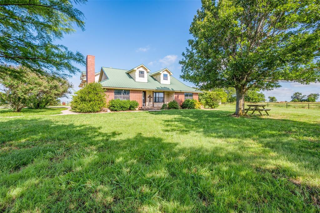 Stunning 190 acre ranch 3 miles West of Gainesville. Rolling terrain, open pastures and plenty of trees. Approximately 1 mile of Elm Branch Trinity River frontage, numerous ponds and some of the best views in Cooke County. Property features a 3 bed 3 bath home renovated in 2013. Renovations included a custom pool with full outdoor kitchen and detached 910 sqft apartment above the garage. Perfect cattle, hunting, hay or recreational property just minutes from downtown Gainesville. Owned by the same family for generations, this is a rare offering that has limitless potential.