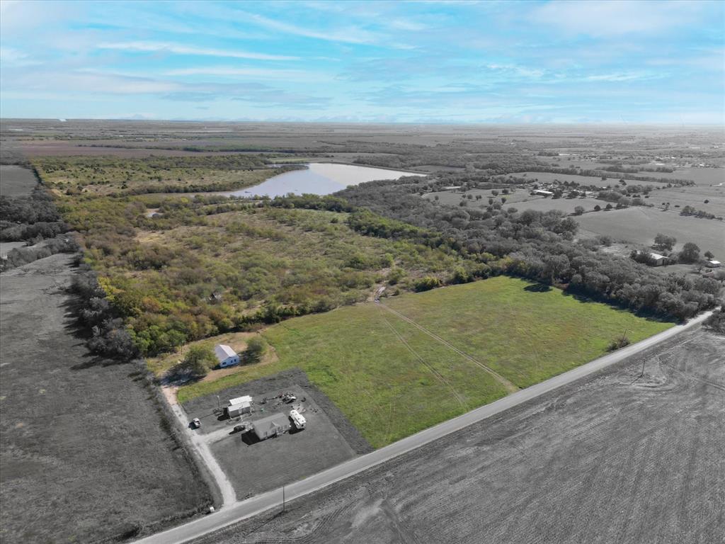Welcome to your own private oasis! This 145-acre property offers a peaceful & secluded recreational paradise, featuring an abundance of mature trees, expansive pasture land, creek, & a portion of a conservation lake – all within the Avalon ISD. Imagine the possibilities as you step onto this remarkable piece of land. Whether you've always dreamt of creating your private ranch, building your dream home, raising livestock, or experiencing some of Ellis County's finest hunting and fishing, this property has it all. Nestled within the property is an old home that presents an exciting opportunity for renovation. A little TLC & this charming home could be transformed into your country retreat or quarters. The property is heavily treed, providing both beauty & privacy. Explore the woods, stoll through the native grass, take in the serene surroundings, and bask in the tranquility of nature. A short drive to nearby Waxahachie opens up a world of shopping, dining, and entertainment options.