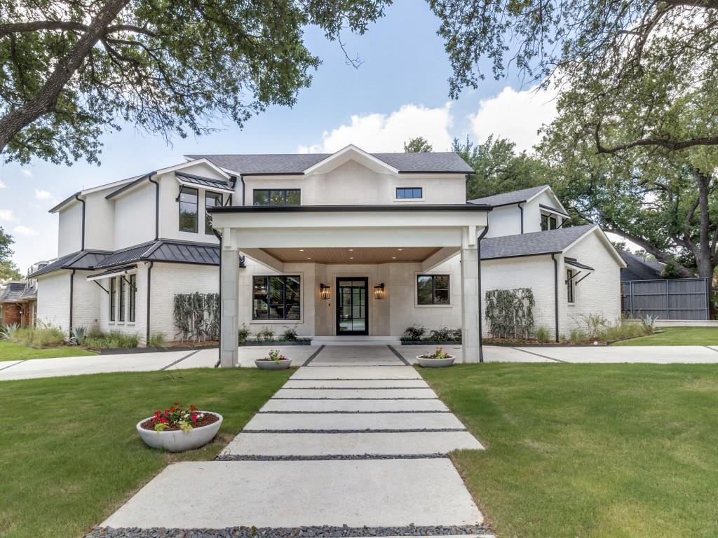 This architectural gem is more than just a home; it is a bespoke sanctuary situated in the highly coveted Windsor Park neighborhood—a quiet, tree-lined enclave in the true heart of Dallas. Designed by a top local visionary, this residence is MOVE IN READY and offers a masterclass in modern luxury, proving that sophisticated design can coexist perfectly with warmth, comfort, and effortless gatherings. From the moment you arrive, the abundance of parking space with a porte cochere for 4 cars plus an oversized circle drive and the striking façade set a tone of exclusivity. The floor plan is a true rarity featuring the primary suite that is fireplace ready if wanted plus two full guest bedrooms on the first level; ideal for growing families and extended stay guests. The second floor features three additional bedrooms and a dedicated entertainment lounge complete with a wet bar and a sprawling balcony with another outdoor fireplace that’s perfect for sunset cocktails or crisp autumn evenings. For the ultimate convenience while entertaining, a dumbwaiter connects the levels, allowing for effortless transport of refreshments and cuisine between floors plus an elevator closet to ensure a forever home for any stage of life. To complete the pinnacle of luxury living, enjoy the private backyard oasis year round with a sparkling pool, outdoor living area with fireplace, and an outdoor kitchen. This home is tucked in a serene community while being mere minutes from the city’s premier destinations including world class shopping at the luxury fashion houses of Highland Park Village and the acclaimed NorthPark Center. This amazing location has premier medical access to The Carrell Clinic, Texas Health Presbyterian, and the Southwestern Medical District and close to SMU and top-tier private and public schools.  Call agent for showings.