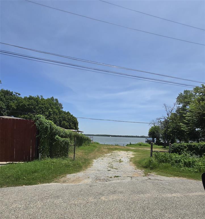 5 Lots • Nearly Half an Acre • Redevelopment Opportunity Near Eagle Mountain Lake
Investor Special! Value is in the land. Home is in poor condition and will likely require extensive rehabilitation or be considered a tear-down. Unique opportunity to purchase a total of 5 lots totaling approximately 0.469 acres in the Eagle Mountain Acres area of Azle. Property includes 2 lots fronting Camp Street and 3 additional adjoining lots accessible from Darling Street, creating multiple possibilities for redevelopment, new construction, or future investment. Existing home is being sold AS-IS, WHERE-IS with no repairs to be made by seller. Convenient location near Eagle Mountain Lake, shopping, dining, and major commuter routes. Buyers to verify all information, zoning, utilities, and development potential.
7160 Camp St, 7161 Darling St, and 7167 Darling St