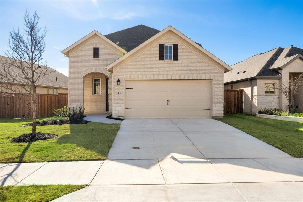 MLS# 21097523 - Built by UnionMain Homes - Ready Now! ~ This stunning new construction single-family residence in the desirable Reunion subdivision offers an impressive 2,588 square feet of living space. With 4 spacious bedrooms and 4 well-appointed bathrooms (3 full and 1 half), this home is designed for comfort and convenience. The open floorplan features a stylish kitchen equipped with granite counters, a kitchen island, and a pantry, perfect for culinary enthusiasts. Enjoy the abundance of natural light in the two living areas and one dining area. Additional highlights include decorative lighting, smart home technology, and walk-in closets. The outdoor space boasts a covered patio and a beautifully landscaped yard complete with a sprinkler system. Situated within the Northwest ISD with schools just a short distance away. Don’t miss this opportunity to own a modern gem!