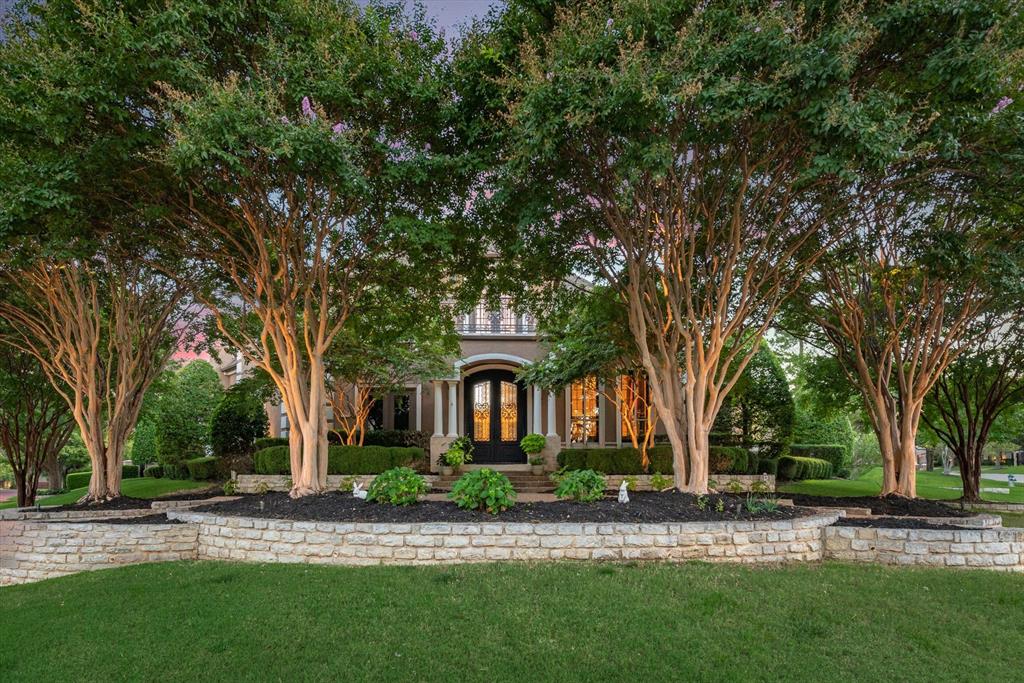 Resort style living in the prestigious golf course community of Timarron. Situated on a near half-acre corner lot, this stunning home features handscraped hardwood floors, plantation shutters, extensive crown molding & 4 fireplaces! Imagine the entertaining potential when you enter & see the sweeping staircase, formal living with abundant natural light, formal dining room & executive study or library. You can have your dream kitchen with custom white cabinetry, large island, dual sinks, 6 burner gas cooktop & double ovens. Spacious family room offers built-ins & fireplace. True master retreat with access to patio & luxurious ensuite boasting dual sided fireplace, oversized walk in shower, dual vanities, freestanding tub & custom closet system. Game & media rooms upstairs plus a wet bar, office niche & balcony overlooking the backyard oasis which features a heated pool & spa, lush landscaping & covered patio with outdoor kitchen. Abundant storage space! 4 car garage with gated access!