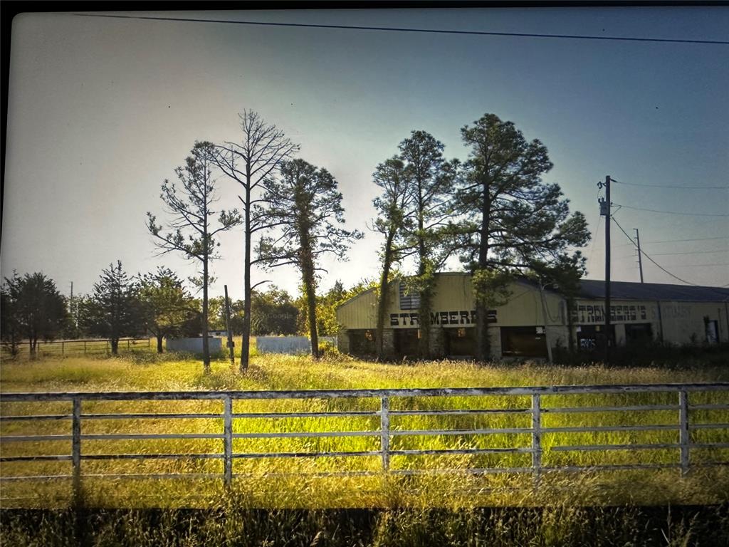 Commercial opportunity in a prime, high-visibility location along the I-30 frontage road. This property features a 21,840± square foot metal warehouse building that was used for storage and operations, along with a 696± square foot mobile home that can serve as on-site office or support space. With access from three separate roads, the site offers excellent circulation, easy ingress and egress, and efficient logistics for daily operations. Exceptional exposure to heavy I-30 traffic provides outstanding visibility, making this an ideal location for a wide range of uses including warehouse, storage, light manufacturing, distribution, or service-related businesses. The strategic location and flexible layout makes this a highly functional property for businesses seeking accessibility, exposure, and operational efficiency.