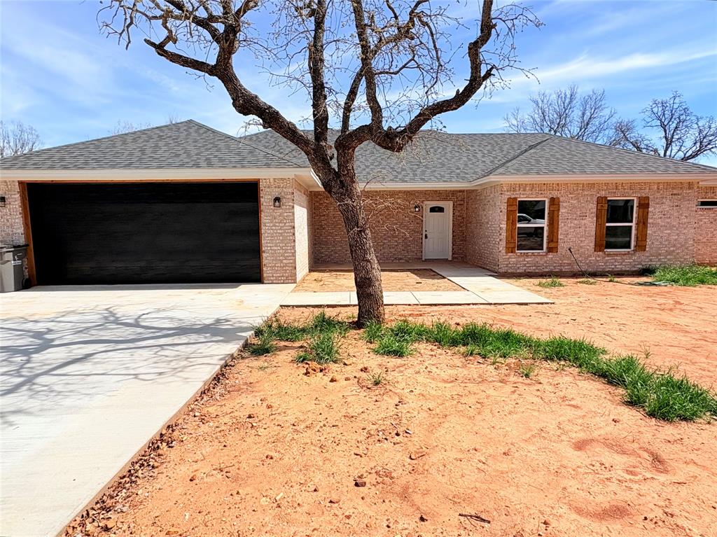 Make this 2,164 sq ft your forever home     Brand-new construction in one of Graham's most desirable neighborhoods-no HOA!. 2-car garage and it is move-in ready!!  COMING SOON - Sod and fence. Spacious open-concept layout with a beautiful modern kitchen featuring granite countertops, stainless steel appliances, a center island, garbage disposal, and a walk-in pantry. Generously sized bedrooms throughout the home.    The primary suite includes a double-sink granite vanity, a large walk-in shower with built-in bench and shelving, two closets (including a walk-in), and a private water closet. The secondary bathroom also features a double-sink granite vanity, with the tub and toilet located in a separate private area for added functionality.    Ceiling fans and LED lighting throughout. Enjoy the covered back porch with a concrete patio-perfect for relaxing evenings and taking in the natural backyard setting.  Don't miss the opportunity to own a beautiful new home in a growing area of Graham. Schedule your private showing today and come experience the comfort and quality this home has to offer.