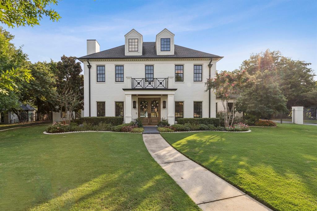 Welcome to 914 Turnberry Lane, a premier entertaining home in Southlake. Nestled on over an acre with mature trees and lush landscaping, this expansive estate features a 5,360 square foot main home with 5 bedrooms, 5 baths, a 600 square foot detached guest suite, and multiple contemporary living and dining areas. The combined 5,960 square feet is loaded with high-end upgrades throughout to ensure comfort and inspiration. The updated kitchen boasts a climate-controlled 700-bottle wine cellar, coffee bar, and wet bar, and 2 large sliding glass doors make way to 1,700 square feet of contemporary outdoor living space and kitchen, completed by a new heated pool, 10-person hot tub, fountains, firepit, and electric screens. The outdoor kitchen is fully equipped, featuring a Lynx grill, warming drawer and power burner, a Big Green Egg, refrigerator and ample storage. The detached guest suite was also constructed in 2022 and serves as a pool house, office, or home gym, complete with a kitchenette and full bath. The primary suite offers an oversized steam shower and heated floors, adding luxury to everyday living. Recent upgrades include two new water heaters in 2023, three new Trane HVAC systems, a sprinkler system upgrade and new carpet throughout in 2025. Enjoy life in one of Southlake’s most sought after established custom neighborhoods with easy access to highways 1709 and 114. This home truly offers it all. Discover your forever home today.