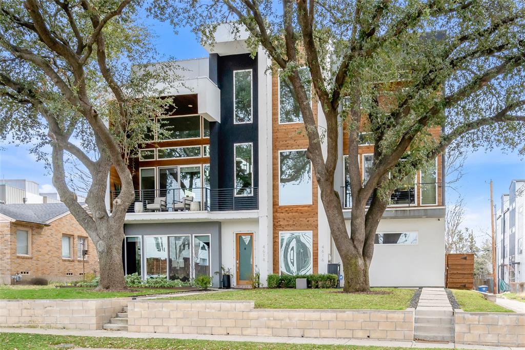 Welcome home to this stunning 3-story townhome in the heart of Dallas! This 3 bed, 3.5 bath residence offers a smart split-bedroom layout with secondary bedrooms on the first floor and a private primary suite on the second. The chef’s kitchen is a true showstopper, featuring stainless steel appliances, a double oven, gas range, chef’s refrigerator, and ample space for cooking and gathering. Hardwood floors highlight the main living areas, and bedrooms, and tile or luxury vinyl in the baths. Decorative lighting adds style throughout.
The primary bath features dual sinks and a Hollywood-style tub and dual shower heads for a spa-like feel. Enjoy a side yard plus a spacious third-floor covered patio—perfect for entertaining! Additional features include a tankless water heater, attached garage with epoxy floors and tesla charger, and washer, dryer, and refrigerator conveying with the sale. Located near shops, dining, and major Hwy 75, this home offers luxury and convenience in one incredible package!