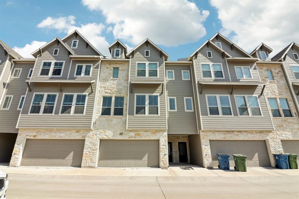 Located in South Village near Old Town Lewisville, this three-story townhome puts you right where lifestyle, convenience, and connectivity meet—just minutes from Main Street dining, shopping, entertainment, and DART access for an easy commute.

Inside, the home opens up to modern finishes and thoughtful design at every level. Quartz countertops, an oversized island, farmhouse sink, stainless steel appliances, designer tile backsplash, and wood flooring throughout create a clean, elevated feel from the moment you walk in.

With 3 bedrooms and 3.5 bathrooms, each bedroom features its own private ensuite bath ideal for guests, roommates, or flexible living. The first-floor suite offers the perfect setup for a home office or private guest retreat with direct access to the backyard.

The second floor serves as the central gathering space with an open-concept living, dining, and kitchen layout designed for everyday living and entertaining. Natural light fills the oversized living area, while the kitchen anchors the space with a large social island, shaker cabinetry, granite surfaces, and a breakfast bar made for connection.

On the third floor, the primary suite creates a true retreat with dual vanities, a freestanding soaking tub, separate walk-in shower, and a spacious walk-in closet. A secondary bedroom with full bath and nearby laundry adds convenience right where it matters most.

Quick access to I-35E and Highway 121 makes this location ideal for both daily living and long-term value.

If you’re looking for low-maintenance living with modern finishes, functional layout, and walkable access to local favorites, this home checks all the boxes.