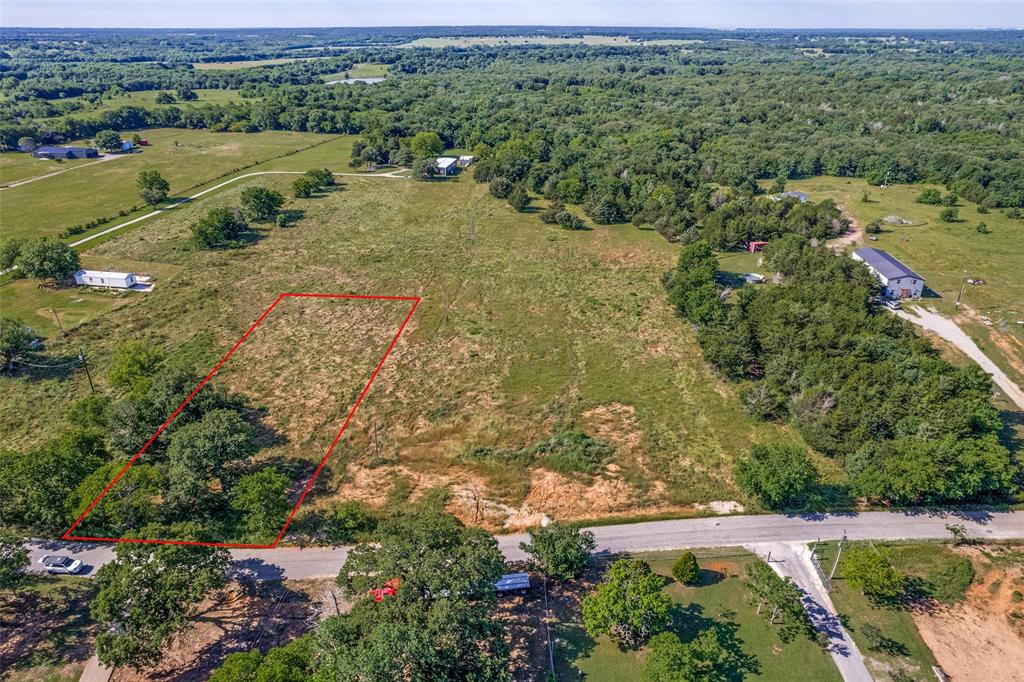 Bring All Offers! Located on a low traffic peaceful road in Denison, this listing includes four generously sized lots being sold seperately or together -offering a unique opportunity to build with flexibility. Whether you want room for a large home, garage, garden, or extra storage buildings, this property gives you the space to bring your vision to life!