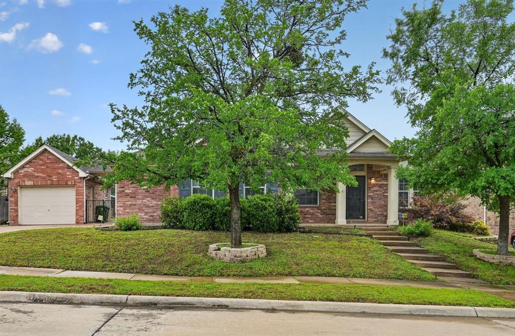 Seller offering up to 2.5% in seller credits to use towards rate buy down or closing costs with preferred lender. Beautifully updated brick home featuring fresh granite countertops, rich wood flooring, and three spacious living areas that offer incredible flexibility for everyday living and entertaining. The property includes a rare 3-car garage plus an air-conditioned second-floor storage space, providing valuable extra room for seasonal items, hobbies, or a future workspace. The layout offers generous room sizes throughout, and the fenced backyard with a covered patio creates a private outdoor retreat perfect for relaxing or hosting gatherings. Located near schools, shopping, and everyday conveniences, this home combines comfort, updates, and functionality in a highly desirable area. A must-see property.