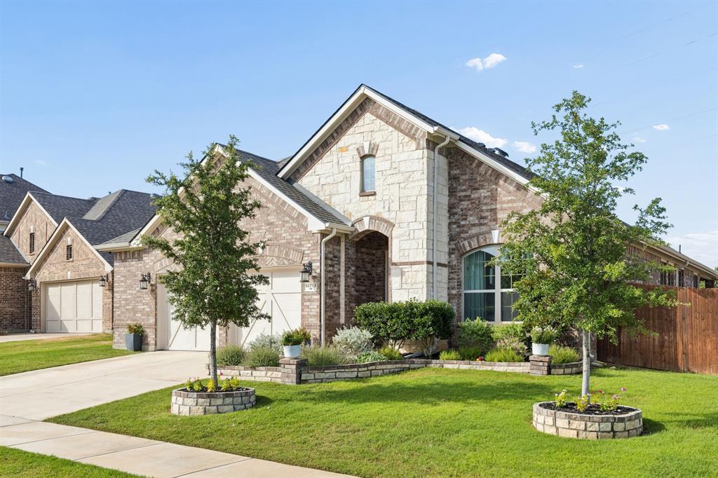 Welcome to this beautifully designed home in the sought-after Seventeen Lakes community, where an open-concept floor plan, thoughtful upgrades, and an exceptional location come together. Offering 4 bedrooms, 2 full bathrooms, plus a dedicated home office, this residence provides the flexibility and space today's lifestyle demands.  At the heart of the home, the chef-inspired kitchen features beautiful cabinetry with elegant glass-front upper cabinets, a gas cooktop, built-in wall oven, pull-out pot drawers, and a spacious walk-in pantry with an etched glass door. The kitchen flows seamlessly into the dining area and expansive living room, creating the perfect setting for everyday living and effortless entertaining.  Natural light fills the spacious primary suite through oversized windows, creating a peaceful retreat. The luxurious ensuite bath offers dual vanities, a soaking tub, a separate walk-in shower with a built-in bench, and a generous walk-in closet. The well-appointed secondary bathroom features dual access, providing added convenience for family and guests.  Step outside to a private backyard designed for relaxation and outdoor enjoyment. Whether you're tending a garden, grilling under the covered patio, or savoring your morning coffee, this outdoor space is ready to become your personal retreat.  Just a short stroll away, you'll find scenic green spaces, walking and biking trails winding around the community's beautiful lake views. Residents of Seventeen Lakes enjoy outstanding amenities, including two resort-style pools, splash pad, two playgrounds, and a community amenity center with picnic areas and grills, all while being conveniently located near shopping, dining, and entertainment. Zoned to highly acclaimed Byron Nelson High School.  Roof upgraded in 2024, interior paint and carpet replaced in 2026.
