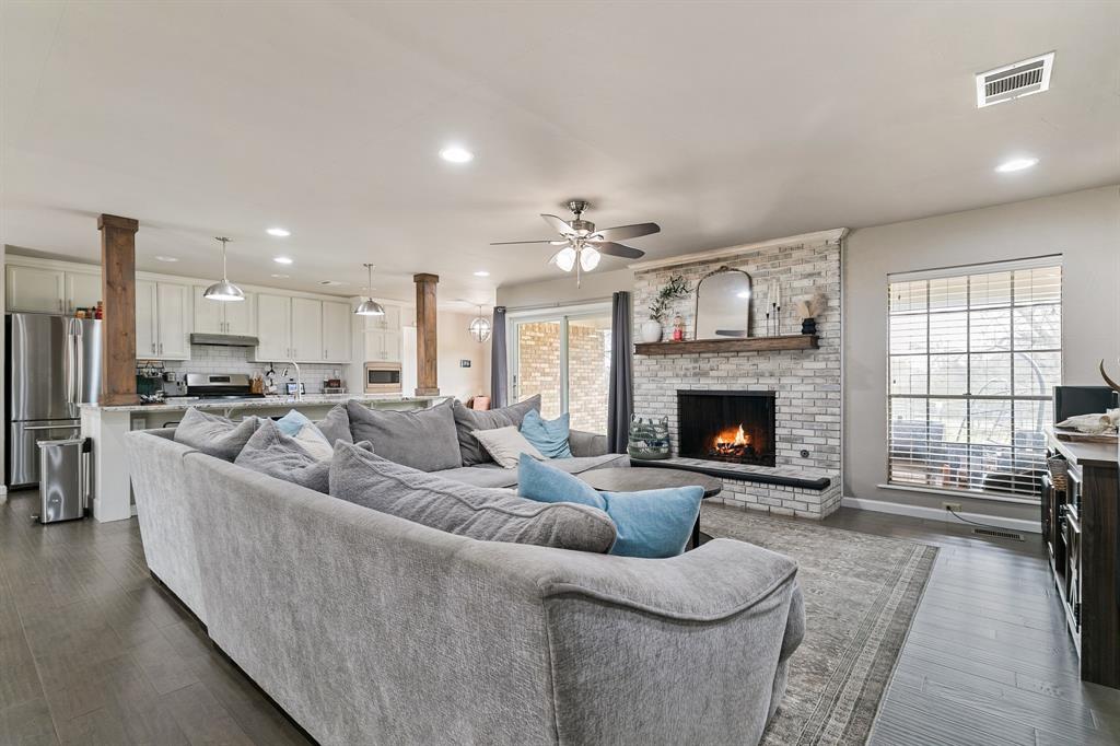 Bright, modern, and irresistibly cute — this renovated open-concept home sits in the heart of Whitesboro, just a short stroll from the annual Peanut Festival. Sun-drenched living spaces flow seamlessly into a sleek, contemporary kitchen with clean lines and stylish finishes — perfect for casual family mornings and lively entertaining. Three cozy bedrooms and two pristine full bathrooms deliver comfort and convenience, while thoughtful updates throughout give the home a fresh, move-in-ready vibe.

Set on an oversized .6-acre in-town lot, the property offers abundant outdoor space for kids to play, animals to roam, gardening, and big backyard gatherings. Walk to downtown restaurants, charming boutiques, and favorite thrift stores for everyday convenience and weekend fun. Small-town charm, modern conveniences, and festival footsteps away — don’t miss this delightful gem.