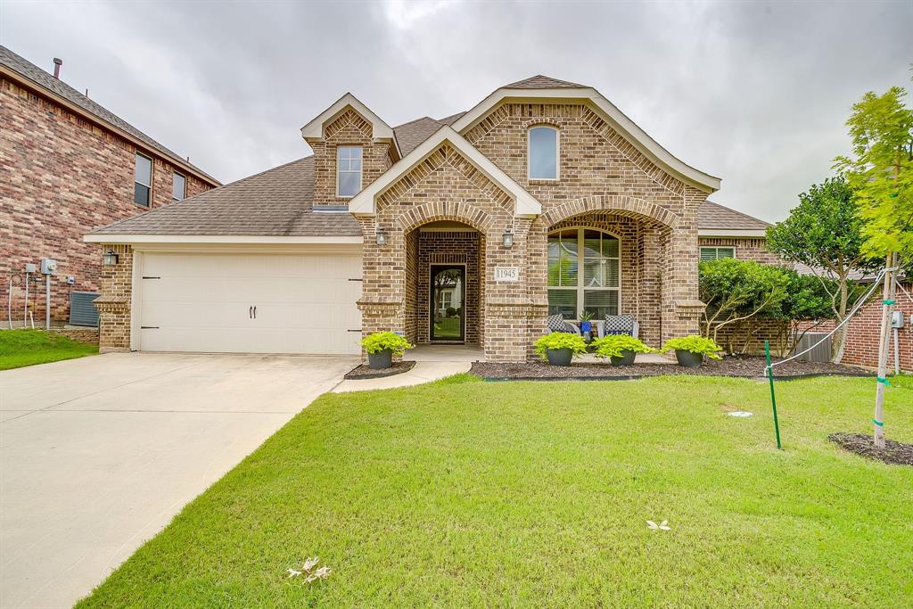Built in 2015 by Clarity Homes, this single-story custom-designed residence offers four bedrooms, two full bathrooms, multiple living and dining spaces, and an expansive backyard complete with a recently added patio ideal for entertaining and everyday enjoyment. Located within the sought-after community of Live Oak Creek, this beautifully upgraded residence blends luxury, privacy, and comfort.

Designed with modern living in mind, the open-concept floor plan features three secondary bedrooms situated in a separate front wing of the home. At the heart of the home, the spacious kitchen showcases a large center island and seamlessly connects to the living and dining areas, creating an inviting space for gathering. Just off the kitchen, you'll find a convenient office nook, laundry room, and access to the attached two-car garage.

The private primary suite overlooks the backyard and features a dual-sink vanity, walk-in shower, and custom walk-in closet. Outside, the oversized backyard is highlighted by a custom patio completed in November 2025, along with pathway lighting for day and evening enjoyment.

Notable upgrades include a roof replacement (June 2025), AC condenser replacement (May 2022), glass security doors, custom lighting, upgraded cabinetry and countertops, custom stair railing, floored attic storage, a Bertazzoni Italian range, and the custom outdoor living space.

Residents of Live Oak Creek enjoy resort-style pools, a splash park, walking and biking trails, playgrounds, and green spaces. Offering a peaceful atmosphere while remaining just minutes from Lockheed Martin and NAS JRB Fort Worth, this home provides the perfect balance of convenience and community living.