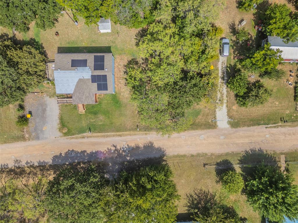Well-Located Vacant Residential Lot in Amenity-Rich Community! Tucked away in the sought-after community Lake Granbury Harbor, this residential property captures the beauty of country living with friendly neighbors and classic pastimes. Perfect for a permanent residence or a vacation spot, the area affords a leisurely lifestyle of relaxation and tranquility. Boating enthusiasts are sure to value the boat ramp, while fishermen will bask in the many varieties of fresh catches. Alternatively, you can start the day at the community pool for a quick swim to beat the Texas heat or frolic at the fun playground! If you enjoy searching for treasure and new experiences, discover delicious restaurants and one-of-a-kind boutiques in Downtown Granbury. You can find excitement at the local golf courses, art museums, fantastic entertainment venues, beautiful parks, wine bars, and theaters. With never a dull moment, you’ll be happy to call Lake Granbury Harbor, Home. Seller Fin. is available with large down payment.