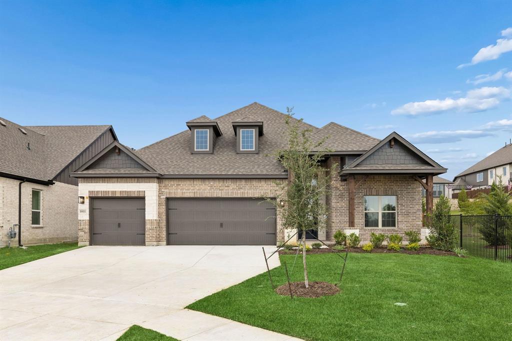 MLS# 21239033 - Built by Sandlin Homes - Ready Now! ~ This stunning new construction home offers a spacious 3,195 square feet of traditional living in the desirable Timberbrook subdivision. Featuring 5 bedrooms and 4.5 bathrooms, this home is designed for both comfort and functionality. The inviting layout includes a beamed ceiling in the open living area, a mudroom with bench and storage, and the secluded bonus room and bedroom upstairs. The gourmet kitchen boasts 3cm quartz countertops, stained and painted cabinets and gold kitchen fixtures.