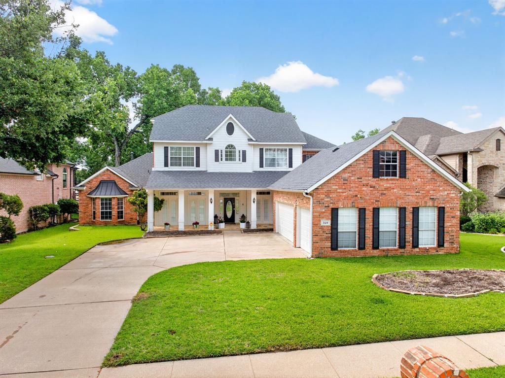 LAKEFRONT LIVING ON EAGLE MOUNTAIN LAKE! Offering approximately 5,000 square feet, 5 bedrooms, 4.5 bathrooms, and nearly half an acre of waterfront property, this extensively updated home delivers the space, views, and lifestyle buyers are searching for. Natural light pours through expansive windows showcasing breathtaking lake views while soaring ceilings, elegant finishes, and a grand staircase create an impressive first impression. The beautifully remodeled family room features custom cabinetry, designer finishes, marble fireplace, crown molding, and updated flooring, creating a warm and inviting gathering space. The renovated kitchen is designed for entertaining with oversized islands, custom cabinetry, marble backsplash, premium appliances, built-in wine refrigerator, abundant storage, and seamless flow into the living areas. Formal living and dining rooms add flexibility, while the private office offers a dedicated workspace with custom built-ins. The primary suite creates a true retreat with lake views, updated flooring, custom closet shelving, and a luxurious spa-inspired bath featuring a two-person jetted tub, designer tile shower, and custom cabinetry. Upstairs, a spacious game room with wet bar provides the perfect setting for entertaining. Outside, enjoy an infinity-edge pool and spa overlooking Eagle Mountain Lake, an expansive patio, firepit area, mature trees, and multiple outdoor living spaces designed to take advantage of the waterfront setting. Dock plans have been approved and permits have been pulled, providing the opportunity to construct a future private dock. Residents of Oak Harbor Estates enjoy access to a community boat ramp, fishing dock, sandy beach, playground, and lakefront amenities. Conveniently located near shopping, dining, and approximately 20 minutes from downtown Fort Worth, this exceptional waterfront property offers the perfect blend of luxury, recreation, and everyday comfort.
