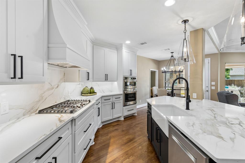 Nestled in the highly sought-after Lacima Haven-Meadows of Stonebridge Ranch, this beautifully updated 5-bedroom, 4.5-bath home offers the perfect blend of luxury, comfort, and functionality. Thoughtfully designed with two bedrooms and 2.5 baths downstairs, the flexible floorplan is ideal for multigenerational living or guests. Rich hardwood floors flow throughout the main living areas, while expansive windows with plantation shutters flood the home with natural light. The fully remodeled kitchen is a showstopper, featuring stylish finishes and seamless flow into the living space. Retreat to the beautifully renovated primary bath for a spa-like experience at home. Step outside to your private backyard oasis complete with a sparkling pool and spa, plus an incredible covered outdoor living area featuring a fireplace and outdoor kitchen — perfect for entertaining year-round. Conveniently located with easy access to Custer and University, this exceptional Stonebridge Ranch home truly has it all. Items that convey with the home include: kitchen refrigerator, washer and dryer, armoire in media room, both outdoor televisions, racks and shelving in garage, and shed behind the fireplace.