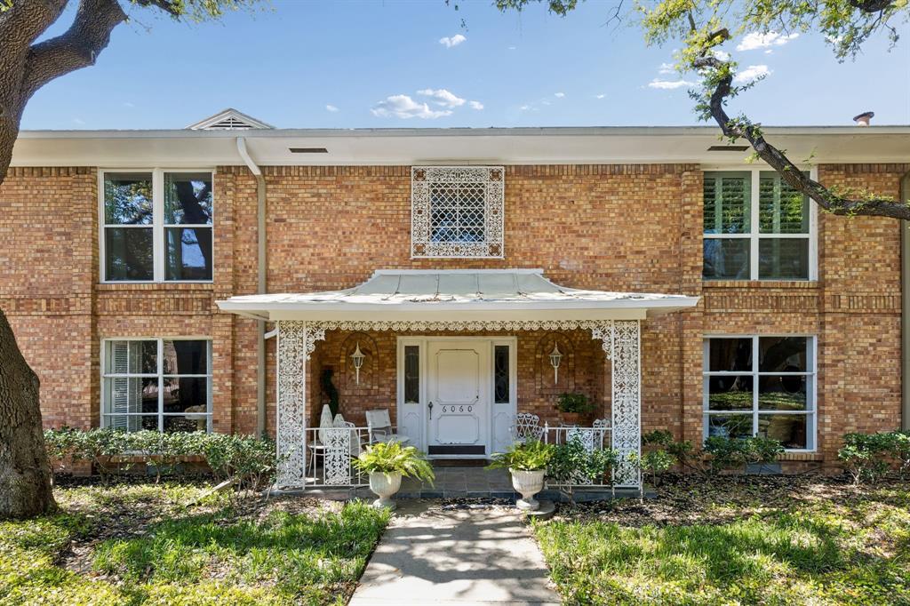 Discover the rare luxury of a three-bedroom retreat in the heart of Preston Hollow at the coveted 6040 Place. This sophisticated residence offers a lock-and-leave lifestyle defined by serenity and convenience, featuring an open-concept layout that feels like a private treehouse. Rich wood floors, plantation shutters, and updated windows frame verdant, tree-top views from the expansive living and dining areas, creating an organic backdrop for both quiet mornings and elegant entertaining. The kitchen flows effortlessly into the social spaces, while the primary suite serves as a peaceful sanctuary overlooking the manicured front courtyard. Two additional guest rooms offer the flexibility of a dedicated home office or library, rare for condo living in 75225. Located just moments from the world-class dining and shopping of Preston Center and the Park Cities, this well-managed community offers unparalleled ease with all basic utilities included in the HOA. Complete with full-sized laundry capabilities and assigned covered parking just steps from your door, this is Preston Hollow living at its most effortless.